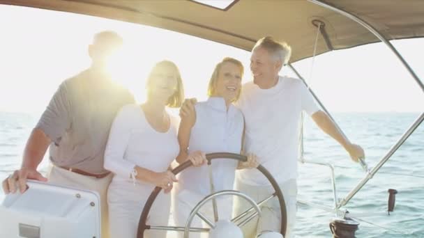 Couples  on their sailing yacht — Stock Video