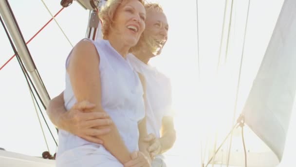 Husband and wife on their sailing boat — Stock Video