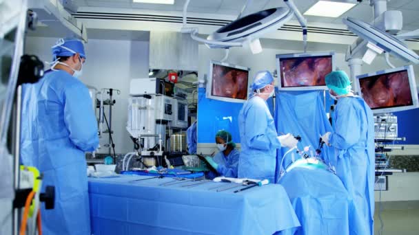 Surgical operation performed by surgeons — Stock Video