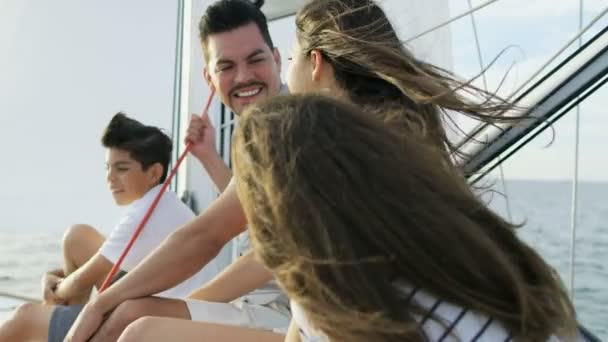 Parents with son and daughter traveling on yacht — Stock Video