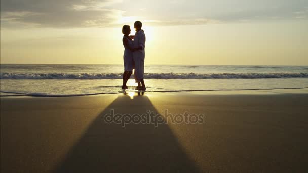 Silhouette Retired Couple Gently Embracing Each Other Beach Sunrise — Stock Video