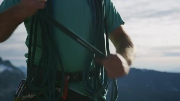 Active Caucasian American Male Rock Climber Preparing Climbing Safety Rope — Stock Video