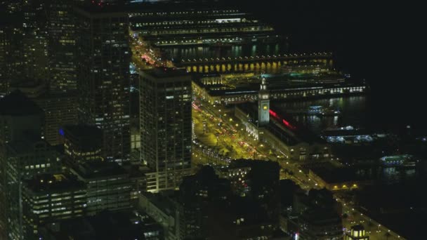 Vista Iluminada Noche Frente Mar Aérea Del Puerto San Francisco — Vídeos de Stock