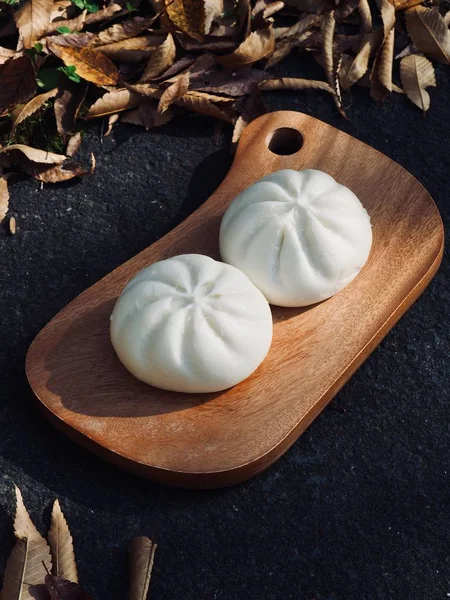 Asian food Steamed bun and fallen leaves