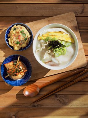Korean traditional food Sliced Rice Cake Soup ,Tteok and dumpling soup clipart