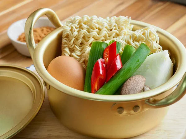 Asian food instant ramen and vegetables