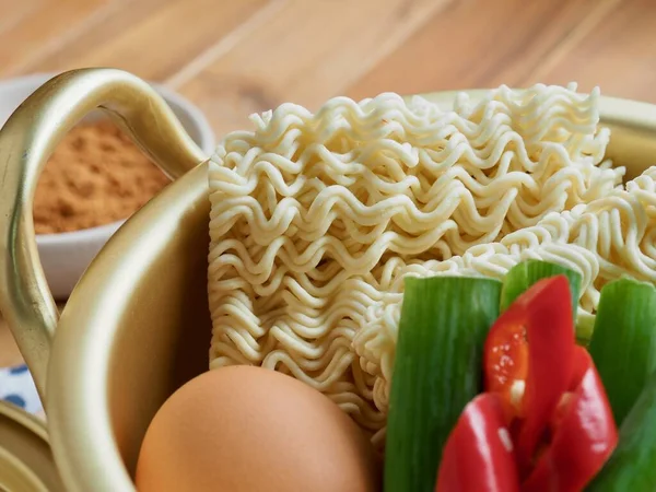 Asian food instant ramen and vegetables