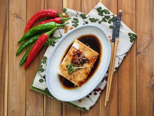 Asian food soft tofu and Soy sauce