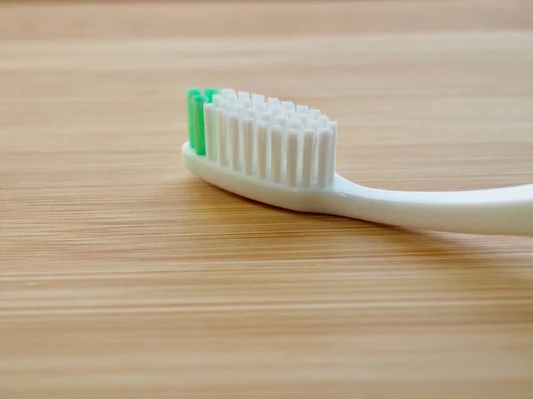 Toothbrush Wooden Board Background — Stock Photo, Image