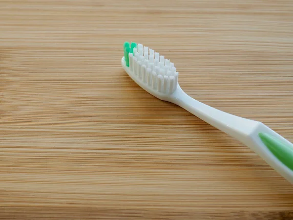 Toothbrush Wooden Board Background — Stock Photo, Image