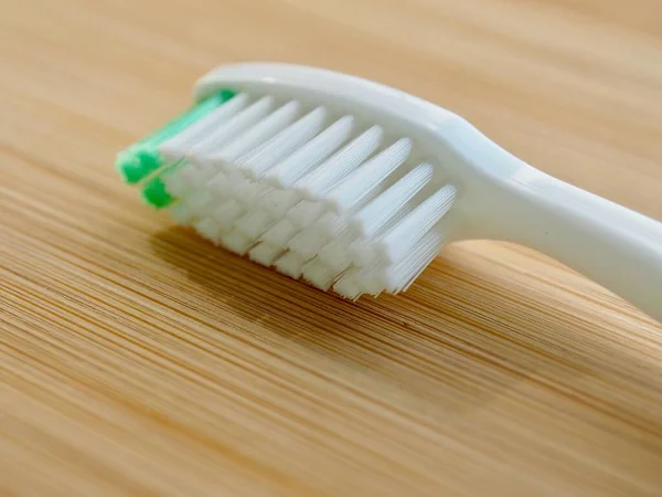 Toothbrush Wooden Board Background — Stock Photo, Image