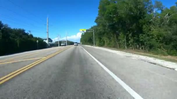 Driving down the road to Key West - Florida Keys Road - first person view — Stock Video