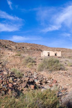 abandoned ruin of natural stones in the desert
