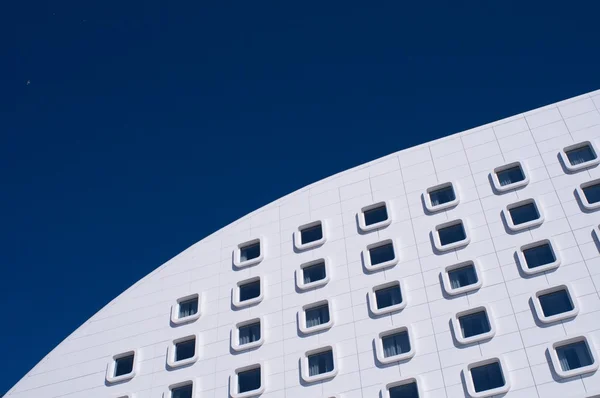 White modern facade of a futuristic building