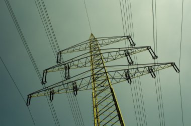 high electricity pylon and blue sky