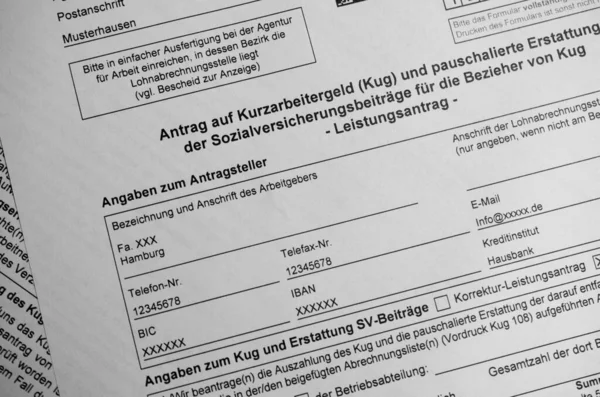ドイツ語の申請書短時間手当 企業の従業員の短時間手当の申請 — ストック写真