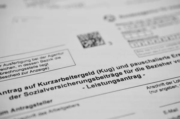 Tysk Ansökningsblankett För Korttidsersättning Översatt Ansökan Korttidsersättning För Anställda Företag Royaltyfria Stockfoton
