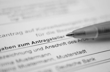 Alman başvuru formu kalem ile kısa süreli harçlık, çeviri: Şirketlerdeki çalışanlar için kısa zamanlı harçlık başvurusu