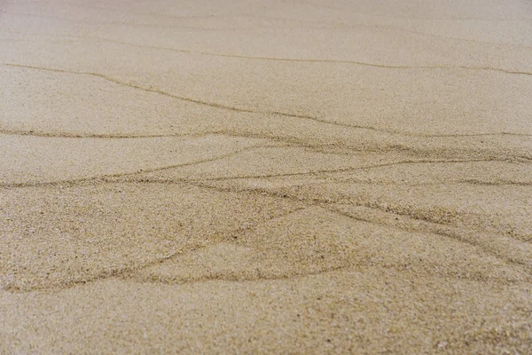 Brown sand texture background from fine sand with natural line wave. — Stock Photo, Image