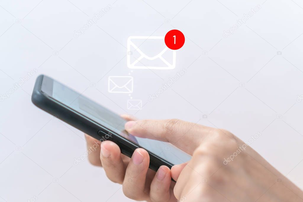 Woman hand use smartphone in public area with 1 new email alert sign icon pop up. Communication business technology.