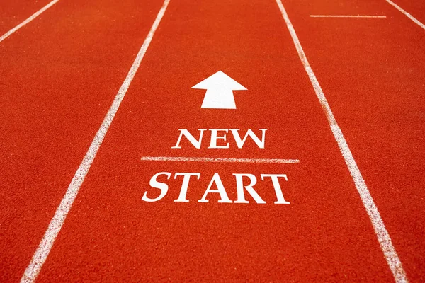 Start line on running court represents the beginning of a journey to the destination in business planning, strategy and challenge or career path, opportunity concept.