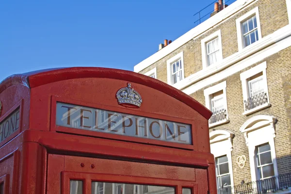 Rode telefooncel in Londen Stockfoto