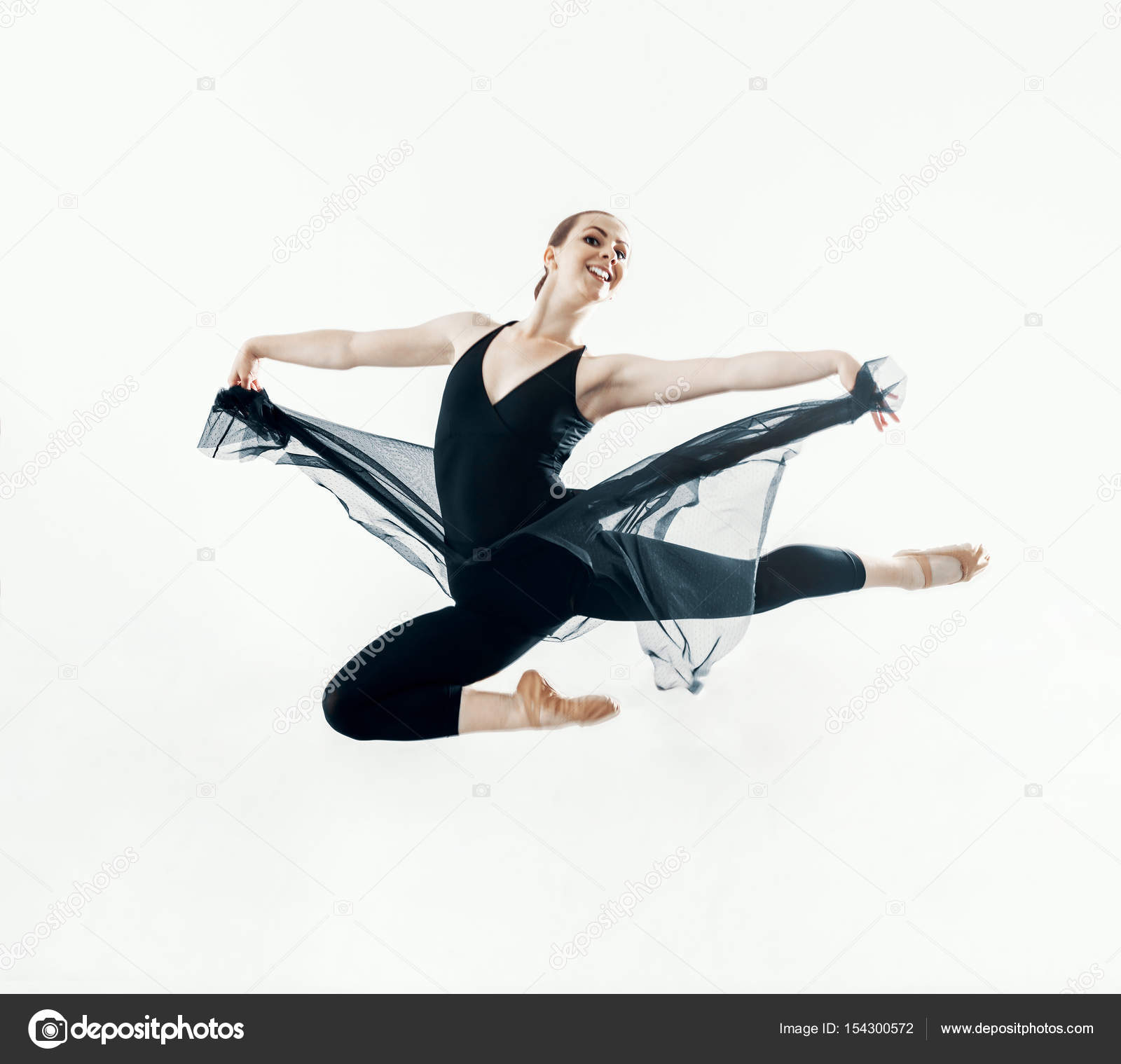 Elegant ballerina jump in ballet hall Stock Photo by ©ozimicians 154300572