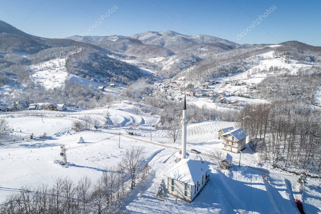 Village during snowy winter season.
