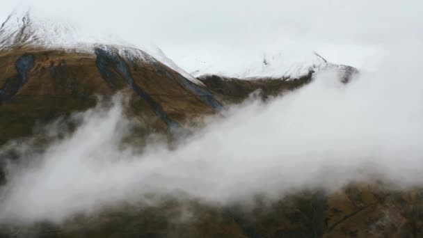 Alps in the clouds. Snow tops — 图库视频影像