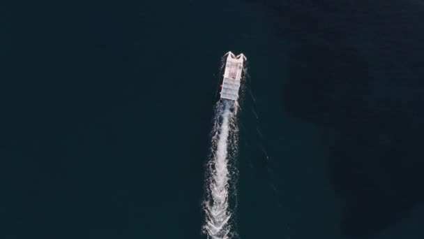 Aerial view of a catamaran, speed boat or yacht sailing in the Cyprus sea — Stock videók