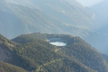 View from Cap de Rep towards Engolasters, you can also see the city of Encamp and Andorra La Vella, Andorra. clipart