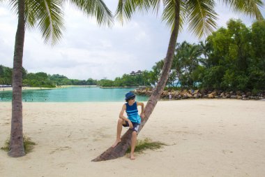 Singapur, Sentosa Adası 'nda genç bir çocuğun portresi.
