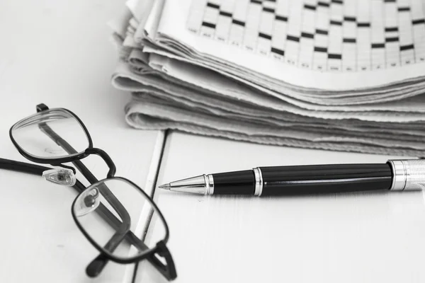 Crossword and pencil on wooden background — Stock Photo, Image