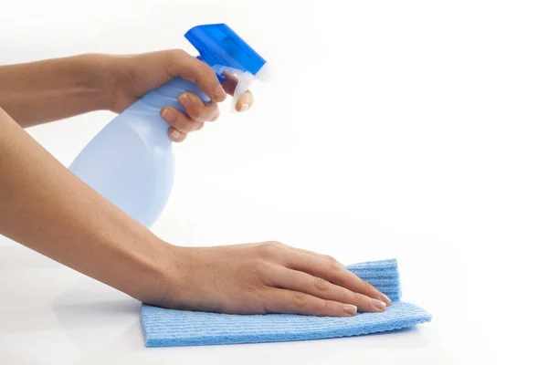 Vrouw handen met reinigingsapparatuur op witte achtergrond — Stockfoto