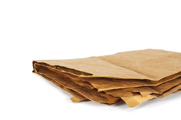 Натуральний коричневий папір на білому тлі — стокове фото