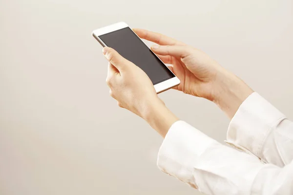 Woman hands holding phone — Stock Photo, Image