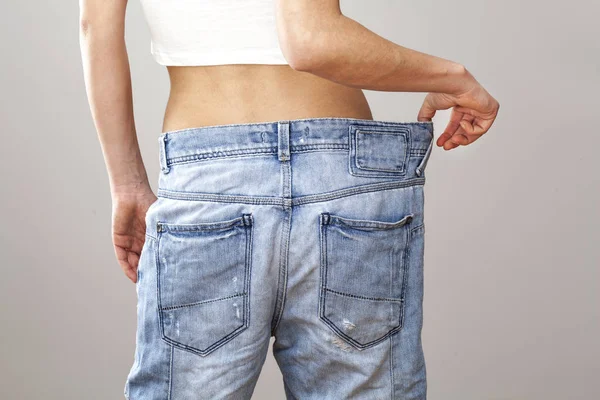 Weight loss woman with bluejeans — Stock Photo, Image