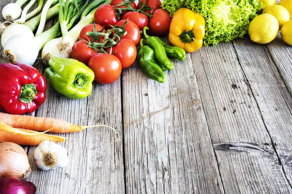 Vegetables on wooden table — Stock Photo, Image