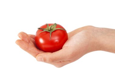 kadın elini tutarak domates