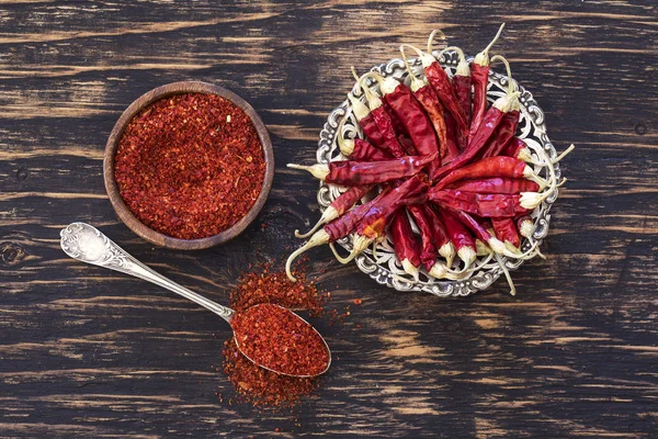 Spices and herbs on wooden background — Stock Photo, Image