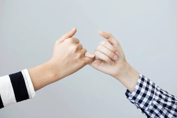 The gesture of the hands mean the promise — Stock Photo, Image