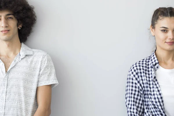 Young people standing next to each other — Stock Photo, Image