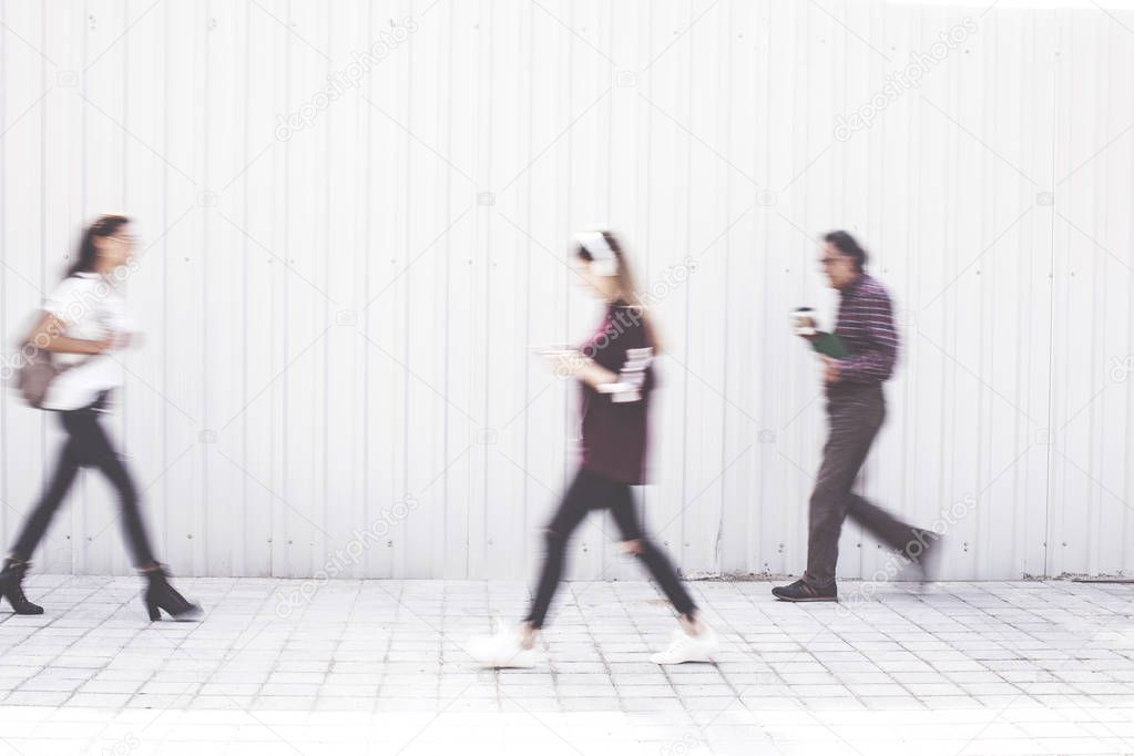 People walking outside blured motion