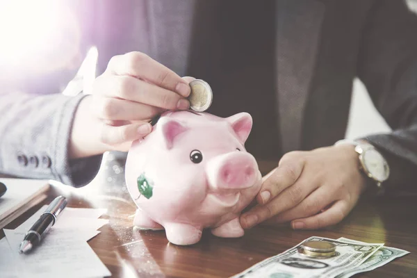 Woman Putting Coin Money Pink Piggy Money Box — Stock Photo, Image