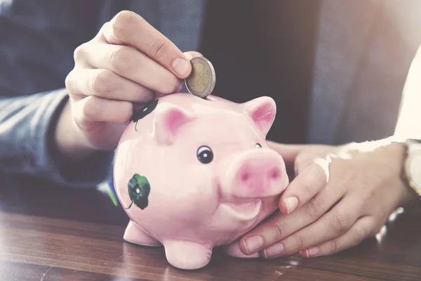 Woman Putting Coin Money Pink Piggy Money Box — Stock Photo, Image