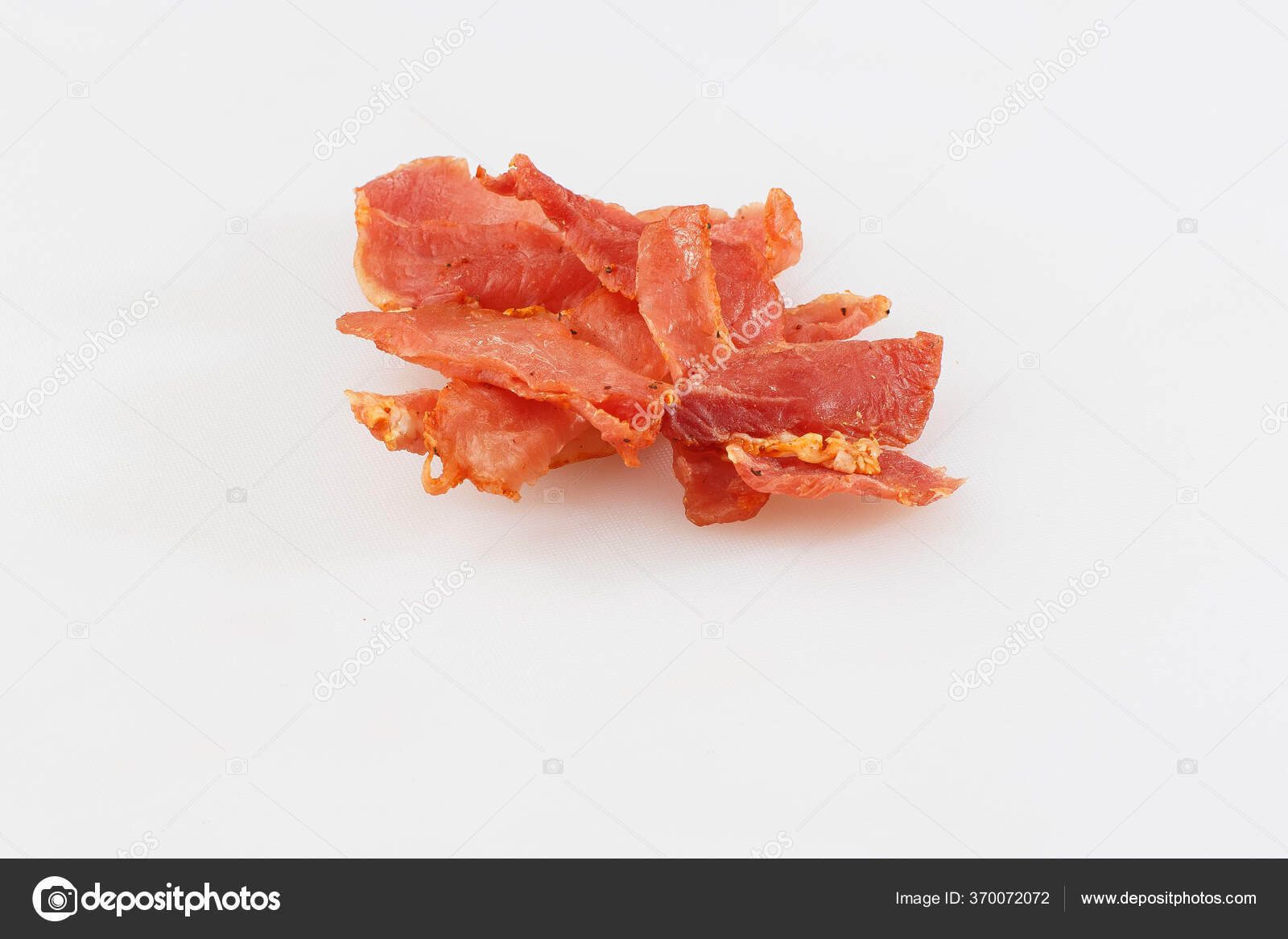 Meat smoked jerky raw meat sausage meat. Close up view on tasty sliced Chicken basturma on