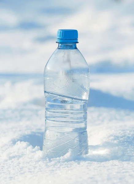 water bottle in snow
