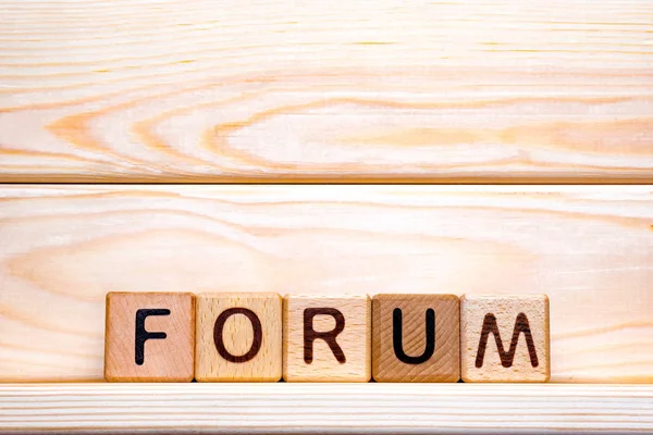 Forum ord koncept. Ordet Forum om träkuber. Forum som ett steg för att utveckla vår verksamhet. Forum för att kontrollera vår hälsa. Forumbakgrund. — Stockfoto