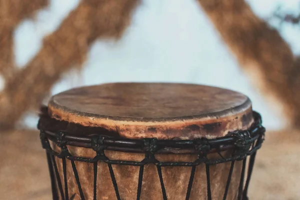 ethnic percussion musical instrument djembe. closeup. selective focus