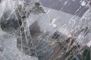 Cracked glass Texture. Top view cracked broken car glass texture background. clipart
